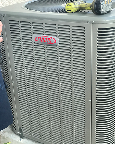 A grey Lennox AC unit representing the appliances worked on by indoor air quality servicer Steve Chapman's All American Air in St. Augustine, FL